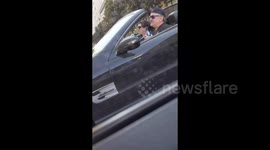 San Francisco driver seen taking hits from whipped cream dispenser at the wheel
