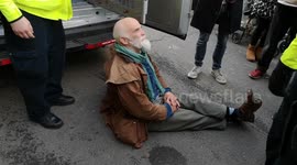 Police arrest elderly Extinction rebellion protester in Whitehall