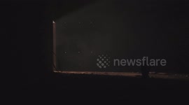 Dark room with a bright opening