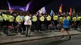 Protestors From Extinction Rebellion Get Hemmed In By Police As They Attempt To March Down Embankment rotestors
