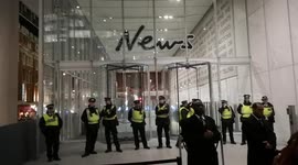 Extinction Rebellion activists protest outside News UK building in London