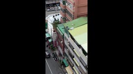Workers Fix Roof Without Safety Harnesses In Taiwan