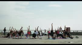 outdoor yoga class at barcelona beach