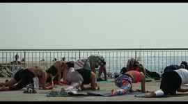 outdoor yoga class at barcelona beach
