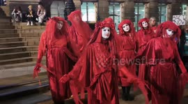 Red Brigade Protesters of Extinction Rebellion appear in Leeds on Light Night