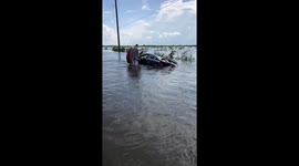Off road truck pull out car stuck in 4ft of floods