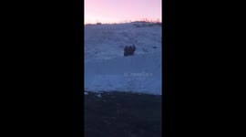 Isis Sio miscalculated her speed and missed her target which caused her to fly off of a 5 foot drift while sledding in North Dakota