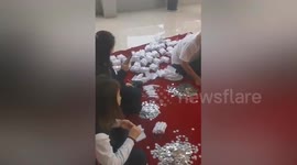 Chinese man uses 250kg coins to pay deposit for car