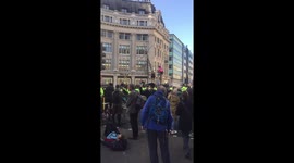 Extinction Rebellion protesters block off Oxford Circus using massive wooden structures
