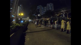 Hong Kong activists form human chain in protest of face mask ban