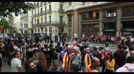 riot police confront protesters at the general strike in barcelona 18 october 2019
