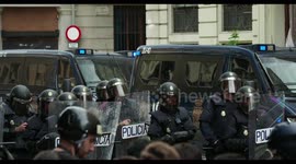 riot police confront protesters at the general strike in barcelona 18 october 2019