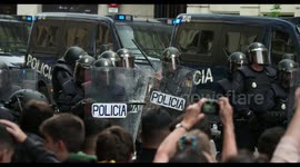 riot police confront protesters at the general strike in barcelona 18 october 2019