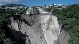 Newsflare Edit - Giant sinkhole in El Salvador prompts evacuations