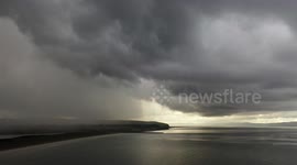 Dramatic Storm Clouds Over Coast By Drone