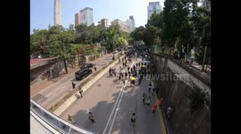Protesters march in Tsim Sha Tsui after police prohibits their protest