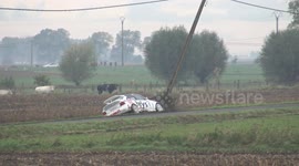 Rally car smashes into utility pole during race in Belgium