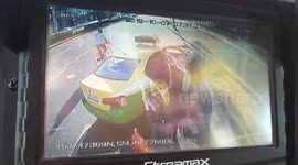 Bus deliberately crashes into taxi which blocks its way after driver was encouraged by passengers