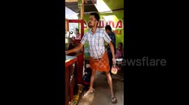 Incredible tea seller pours tea from a height of one metre without spilling the drink in southern India