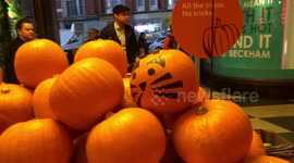 Spectacular bright orange Halloween pumpkins display at Whole Foods Market in Kensington - London