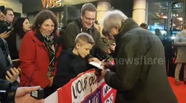 British film director Ken Loach signs autographs at premiere of 'Sorry We Missed You' in London's Leicester Square