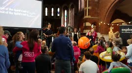Modern, happy, family Church service