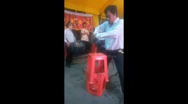 Man uses electric drill to pierce his nose at show in Vietnam