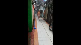 Old Man Slides On Wet Tiles During Typhoon