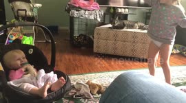 Girl makes baby sister laugh with karate moves
