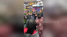 Shocking moment suspected shoplifters fight with shopkeepers in London