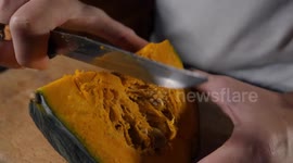 Cutting a pumpkin