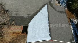 Snow and symmetry in my roof from a drone