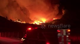 Smoke rises from California hillside amid the Kincade Fire