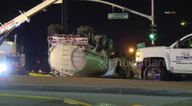 Gas tanker truck rolls over and crashes due to strong Santa Ana winds