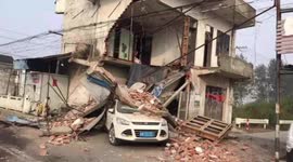 Two-storey house collapses after being hit by car in eastern China