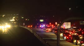 One Dead in Three Car Freeway Collision with One Trapped