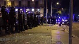 Riot police shoot rubber bullets at protestors in Barcelona