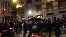 Protestors clash with police in Barcelona