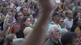 catalonian protesters sing in solidarity