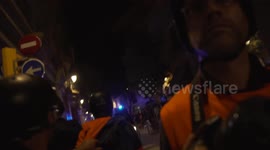 Police Riot Van charges through street to confront pro-independence protesters. Barcelona