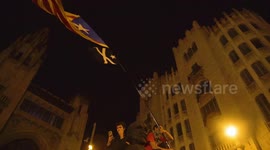 Catalonian Flag patriotically waved over Statue, Barcelona