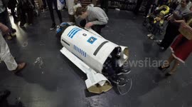 Malfunction! Hilarious moment man in R2D2 costume falls over at Comic Con