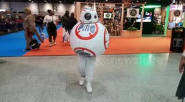 A Human Trys On A BB8 Cosplay Outfit At The MCM Comic Con In London