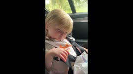 Adorable video shows UK toddler fall asleep while eating a sweet