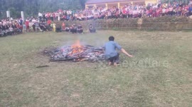 The men danced on the burning bonfire
