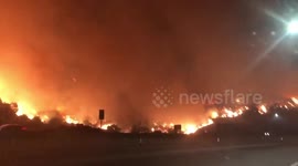 Evacuees film frighteningly close blaze along 405 Freeway near Getty Center