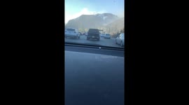 Helicopter dropping water on the Getty fire, filmed on 405-S