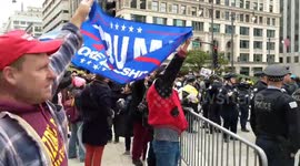 Pro and anti-Trump protesters clash on the streets of downtown Chicago