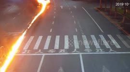 Car leaves trail of flames on Chinese highway after drunk driver crashes into central reservation