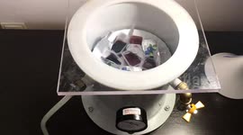 Ukrainian scientist uses vacuum chamber to pop open packets of food
